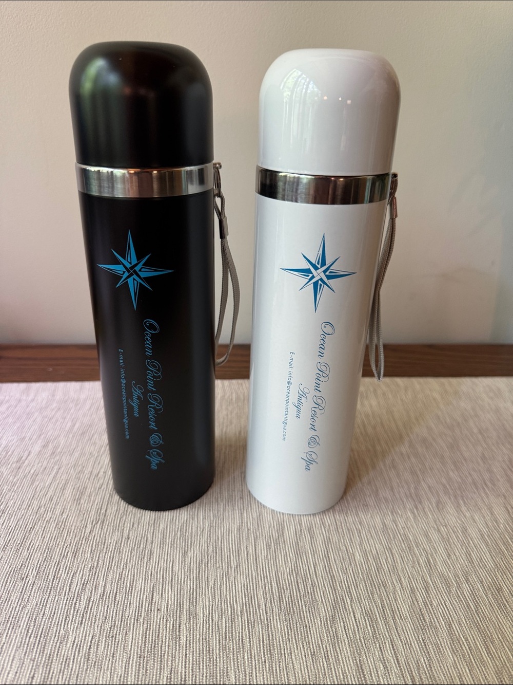 Set of 2 Stainless Steel Travel Bottles - one Black, one White